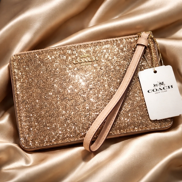 Coach Handbags - New In Box Coach Glitter Star Wristlet